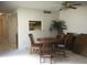 Cozy dining area with wood table and chairs, adjacent to the kitchen at 1511 Belero St, Broomfield, CO 80020