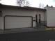 Charming townhouse featuring a convenient attached garage and landscaped front entrance at 1511 Belero St, Broomfield, CO 80020