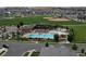 Aerial view of neighborhood pool and recreation area at 90 Pipit Lake Way, Erie, CO 80516