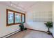 Bright bedroom with large window, mountain views, and built in shelving at 135 Poorman Rd Rd, Boulder, CO 80302