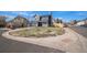 Charming two-story home with a blue exterior, well-manicured lawn, and a cozy front porch at 8653 Red Clover Ct, Parker, CO 80134