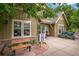 Charming building exterior with a memorial bench, and a little library at 14000 Winding River Ct # T3, Broomfield, CO 80023