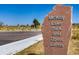Stone sign for the McKay Lake Park and Open Lands with parking nearby at 14000 Winding River Ct # T3, Broomfield, CO 80023