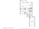 First floor layout featuring a kitchen, dining room, living room, foyer, bathroom, laundry room, and a garage at 14000 Winding River Ct # T3, Broomfield, CO 80023
