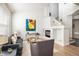 Spacious living room with a fireplace, modern decor, and an open layout at 14000 Winding River Ct # T3, Broomfield, CO 80023