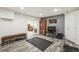 Finished basement space with luxury vinyl flooring and workout equipment at 9714 Chanteclair Cir, Highlands Ranch, CO 80126