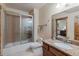 Neutral bathroom featuring a shower/tub combo, granite countertop and wood accents at 378 Juniata Cir, Breckenridge, CO 80424