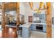 Beautiful kitchen with stainless steel appliances, an island, and seamless access to the dining area at 378 Juniata Cir, Breckenridge, CO 80424