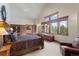 Main bedroom features large windows with scenic views and a sitting area at 378 Juniata Cir, Breckenridge, CO 80424