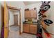Mud room with ski storage, utility sink, wooden door and ample storage cabinets at 378 Juniata Cir, Breckenridge, CO 80424