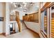 Stairway with log railing leads to the living area at 378 Juniata Cir, Breckenridge, CO 80424