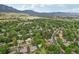 Panoramic view of the neighborhood with lush greenery and majestic mountain views at 40 S 34Th St, Boulder, CO 80305