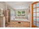 Bathroom features a soaking tub with tile surround and a separate glass block shower at 40 S 34Th St, Boulder, CO 80305