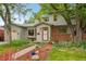 Charming home featuring a walkway, landscaped garden, and a cozy front porch at 40 S 34Th St, Boulder, CO 80305