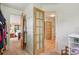 Hallway with access to carpeted bedroom and tiled bathroom at 40 S 34Th St, Boulder, CO 80305
