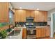 Functional kitchen with granite countertops, a gas range, and plentiful storage at 40 S 34Th St, Boulder, CO 80305