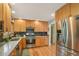 Modern kitchen featuring stainless steel appliances and bright wooden cabinetry at 40 S 34Th St, Boulder, CO 80305