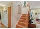 Wooden staircase with handrail leading to the second floor of the home at 40 S 34Th St, Boulder, CO 80305