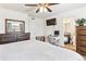 Bright bedroom with neutral color scheme, desk, and ensuite bathroom at 20017 E 48Th Pl, Denver, CO 80249