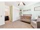 Cozy bedroom with view to bathroom and closet at 20017 E 48Th Pl, Denver, CO 80249