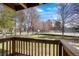 Balcony view features a lovely outdoor space with greenery, mature trees, and beautiful landscaping at 1842 S Pitkin Cir # A, Aurora, CO 80017