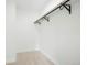 Walk-in closet is compact and designed with a hanging rod for storage at 1842 S Pitkin Cir # A, Aurora, CO 80017