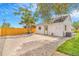 The backyard features a concrete patio, perfect for outdoor dining and entertaining at 3452 S Clay St, Englewood, CO 80110