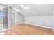 Cozy bedroom with wood-look floors and white walls at 3452 S Clay St, Englewood, CO 80110