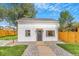 Charming single-story home with a fresh exterior and neat landscaping for great curb appeal at 3452 S Clay St, Englewood, CO 80110