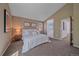 Primary bedroom with ensuite bathroom access, neutral tones, and comfortable layout at 2364 S Harlan St, Lakewood, CO 80227