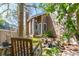 Beautiful home with a landscaped front yard, rock feature and mature trees at 2364 S Harlan St, Lakewood, CO 80227