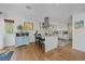 Modern kitchen featuring stainless steel appliances and an island with seating at 2364 S Harlan St, Lakewood, CO 80227