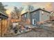 Charming backyard featuring a stone patio with comfortable seating, perfect for outdoor relaxation and entertainment at 1047 Meade St, Denver, CO 80204