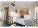Inviting bedroom featuring decoratively painted floors, a daybed, and decor creating a unique, inviting space at 1047 Meade St, Denver, CO 80204