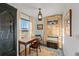 Bright office featuring a desk, chair, bookcase and natural light creating an ideal work-from-home environment at 1047 Meade St, Denver, CO 80204