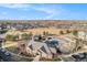 Beautiful aerial view of the community clubhouse, pool, and playground; a wonderful community to call home at 17297 Wilde Ave # 205, Parker, CO 80134