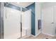 Bathroom showcasing a glass-enclosed shower with built in seating and modern fixtures at 17297 Wilde Ave # 205, Parker, CO 80134