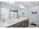 Bathroom featuring a double sink vanity with modern faucets and decor at 17297 Wilde Ave # 205, Parker, CO 80134