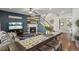 Open living space features a fireplace, television, and decorative accents at 7251 S Old Hammer Way, Aurora, CO 80016