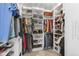 Spacious walk-in closet with custom shelving and ample storage for clothing and accessories at 7251 S Old Hammer Way, Aurora, CO 80016