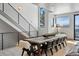 Dining room features a large wooden table and mountain views from the windows at 310 N Fuller Placer Rd, Breckenridge, CO 80424