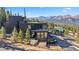 Modern home with a spiral staircase, balconies, and mature trees at 310 N Fuller Placer Rd, Breckenridge, CO 80424