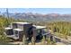 Modern home with spiral staircase, balconies, and mountain views at 310 N Fuller Placer Rd, Breckenridge, CO 80424