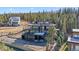 Multi-level home with balconies, garage, and long driveway at 310 N Fuller Placer Rd, Breckenridge, CO 80424