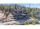 Multi-story home with balconies overlooking wooded area at 310 N Fuller Placer Rd, Breckenridge, CO 80424