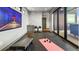 Spacious home gym with modern equipment, sliding glass doors, and a view of the outside at 310 N Fuller Placer Rd, Breckenridge, CO 80424