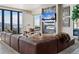 Stylish living room with a fireplace, mountain views, and comfortable seating at 310 N Fuller Placer Rd, Breckenridge, CO 80424