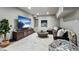 Spacious living room has a TV, a leather sectional, and views at 310 N Fuller Placer Rd, Breckenridge, CO 80424
