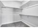 Walk-in closet with carpet and multiple shelves at 4232 Jason St # 7, Denver, CO 80211