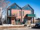 Attractive modern brick townhomes boast sleek lines, balconies, and contemporary curb appeal at 4232 Jason St # 7, Denver, CO 80211